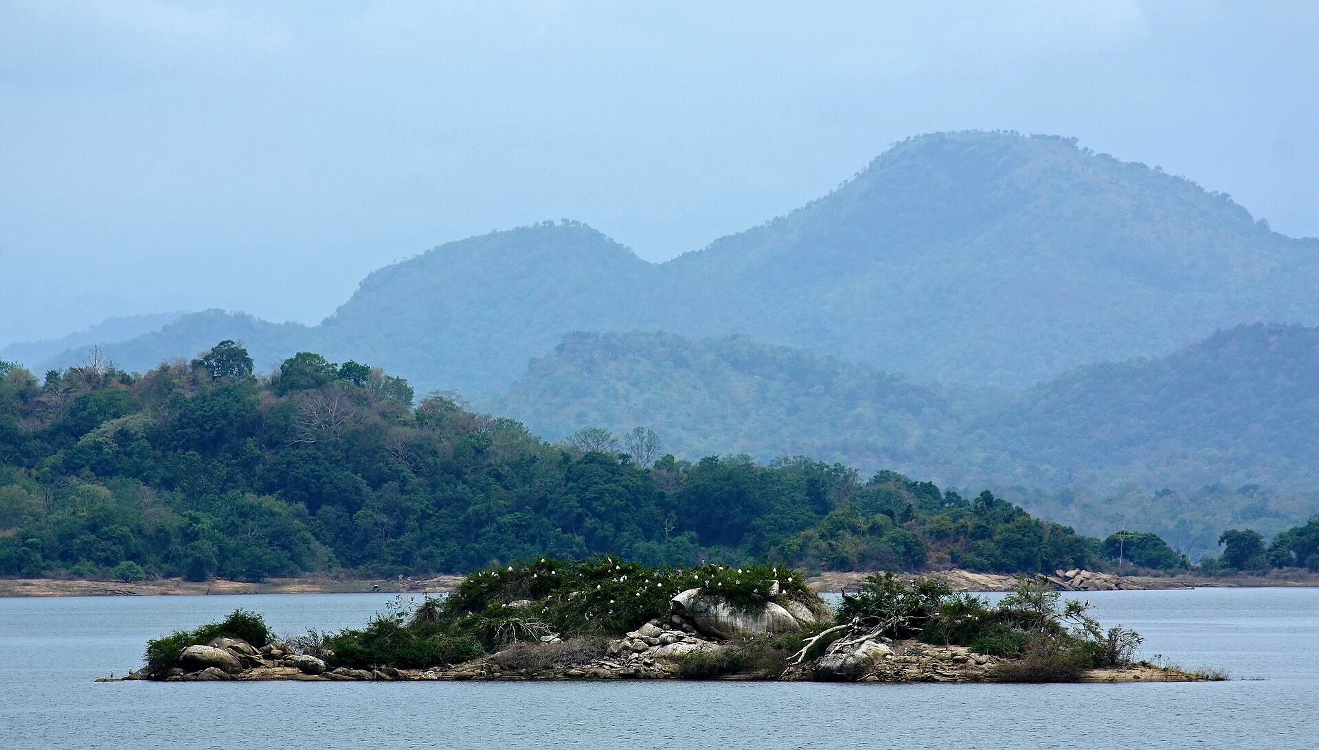 Senanayake Samudra reservoir and hills in Gal Oya National Park, Sri Lanka