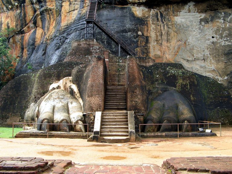 How to Get to Sigiriya from Colombo: Car, Train or Bus Giant lion paws and staircase at the Lion Terrace of Sigiriya Rock