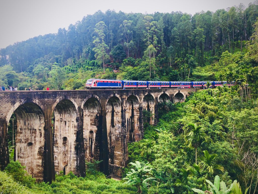 Train crossing the Nine Arch Bridge in Ella, Sri Lanka